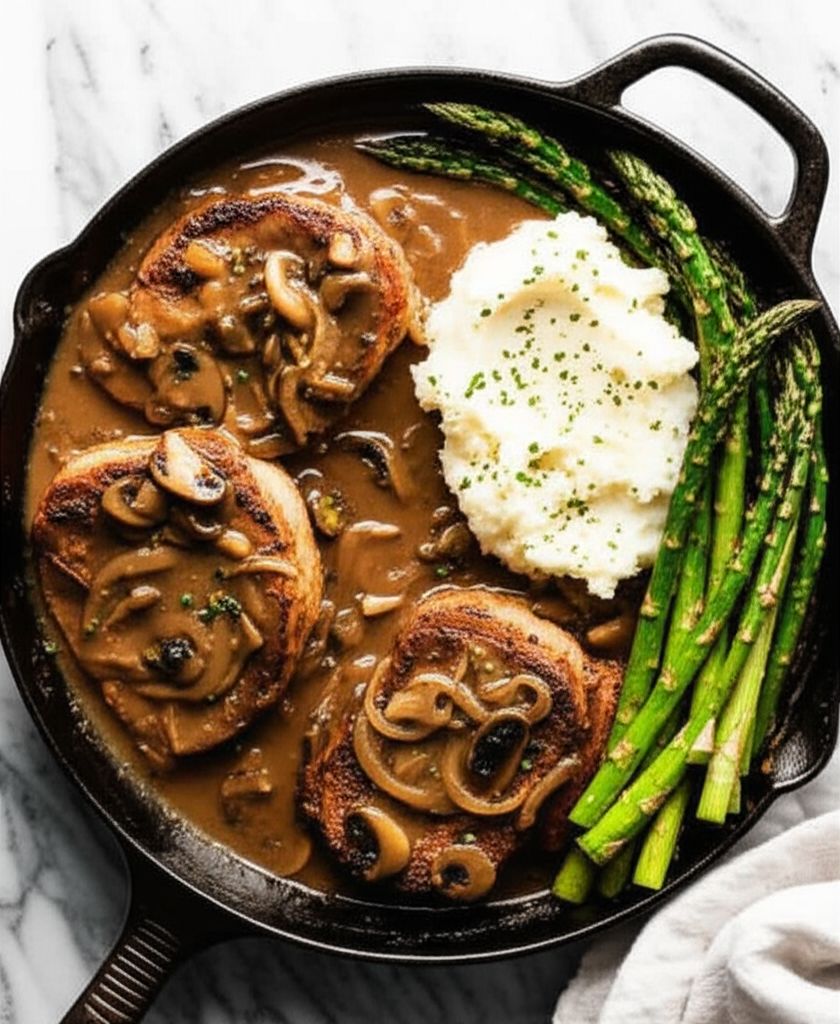 Smothered Pork Chops with Bourbon and Mushrooms